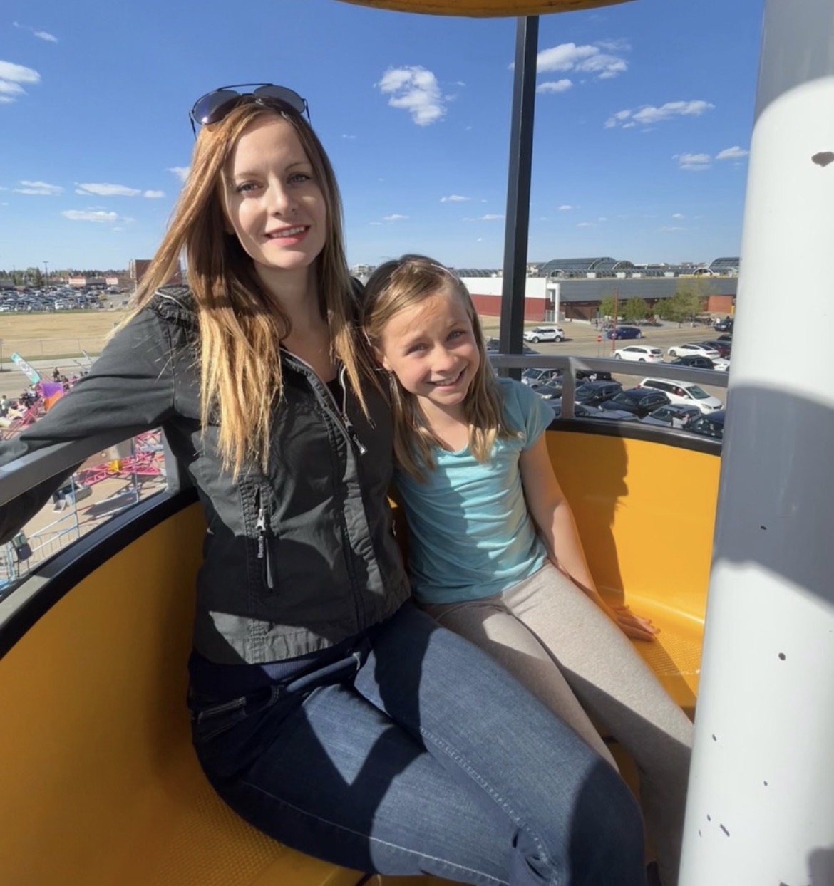 On the wheel with her daughter on a bright spring day
