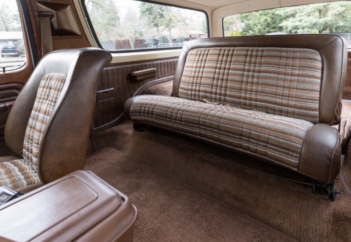 Finished truck interior with custom striped bench seats