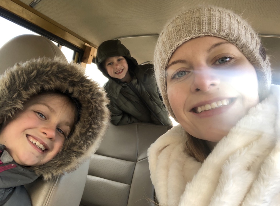 Winter drive with both kids in the cab of the old truck