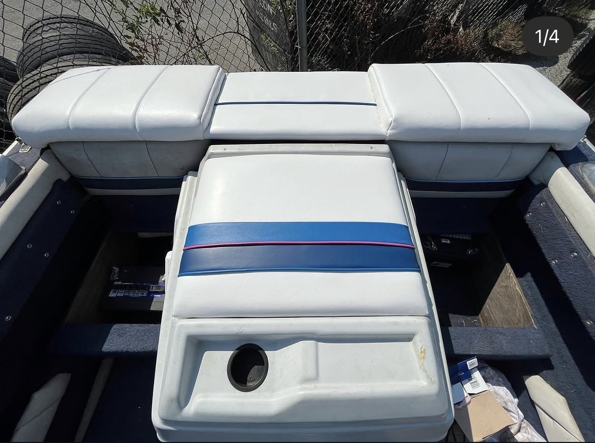Rebuilt boat seating in white with blue and pink trim