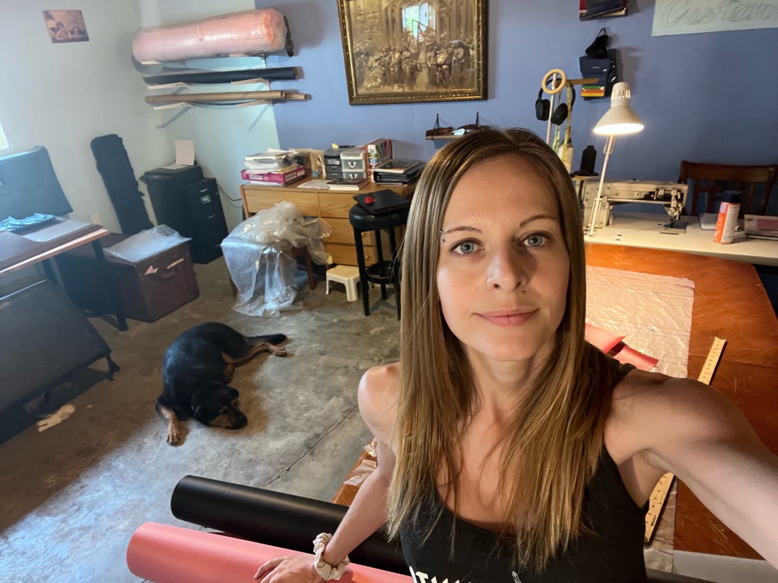 The home workshop, sewing machine and rolls of material